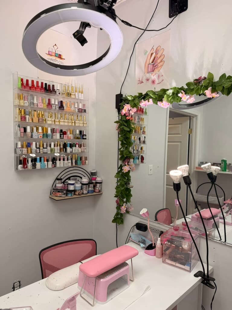 Nail station with ring light and florals